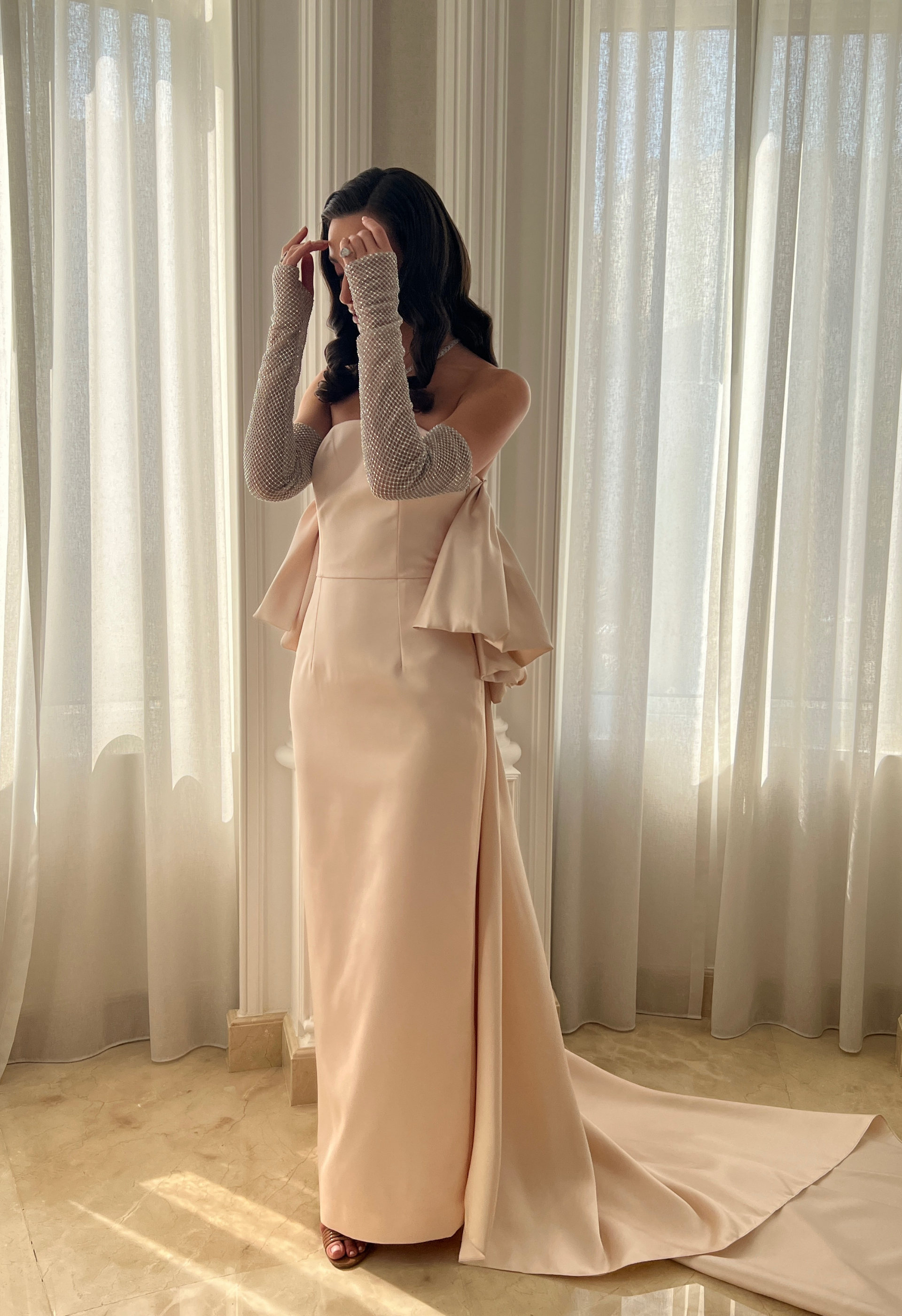 Gown with rhinestone sleeves