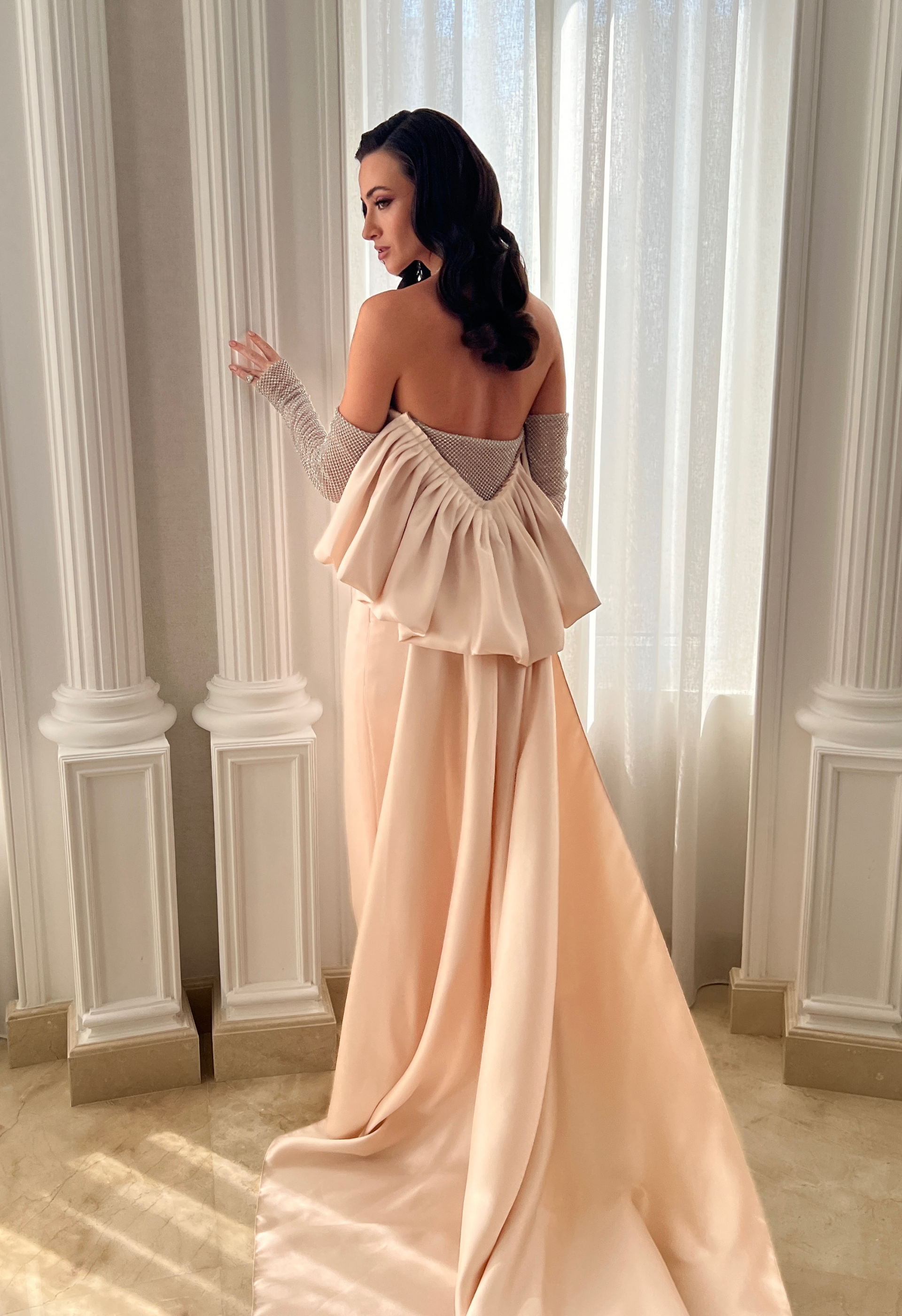 Gown with rhinestone sleeves