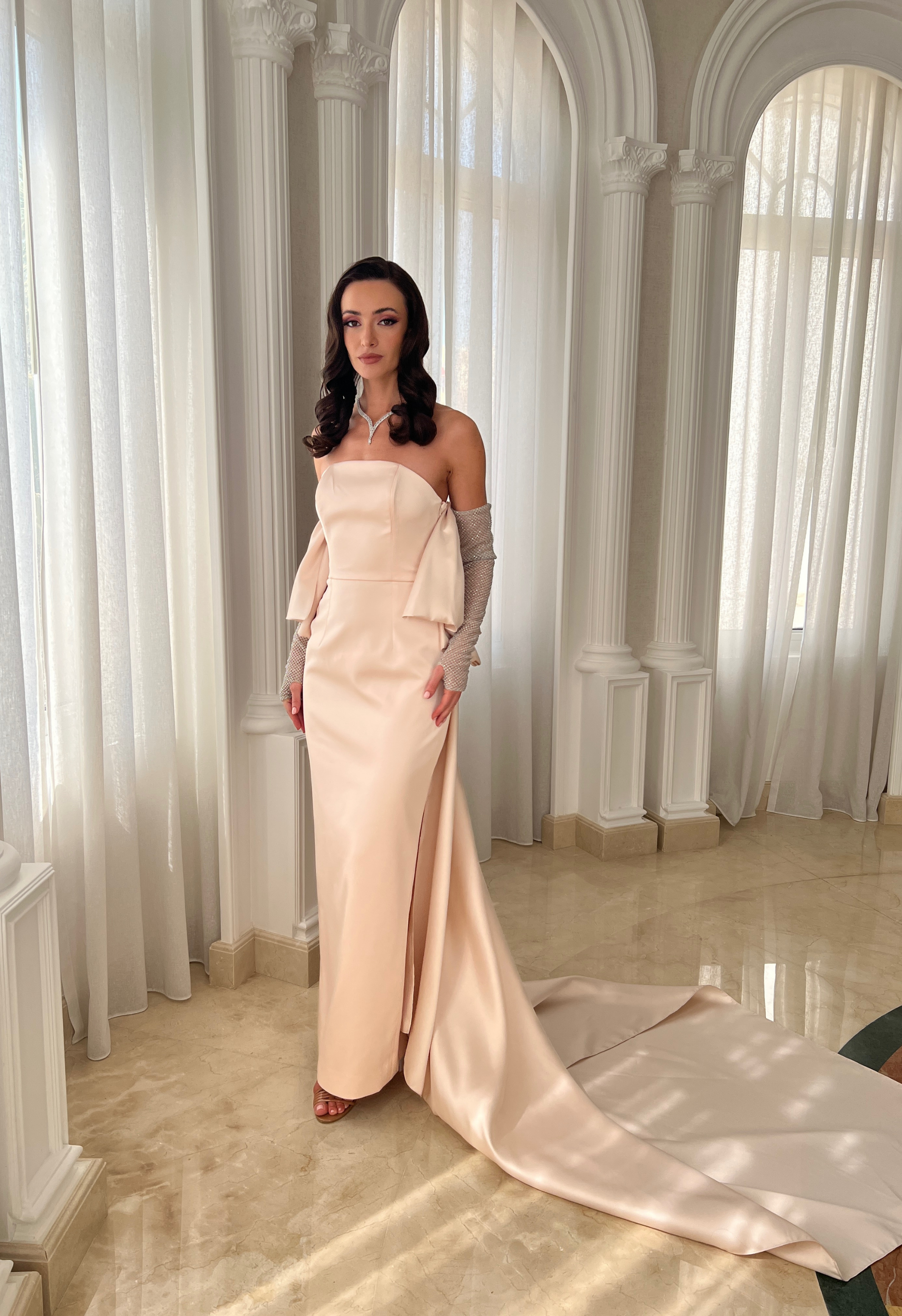 Gown with rhinestone sleeves