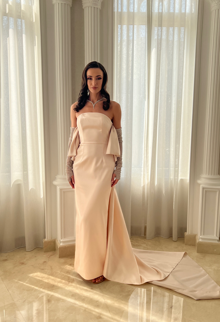 Gown with rhinestone sleeves