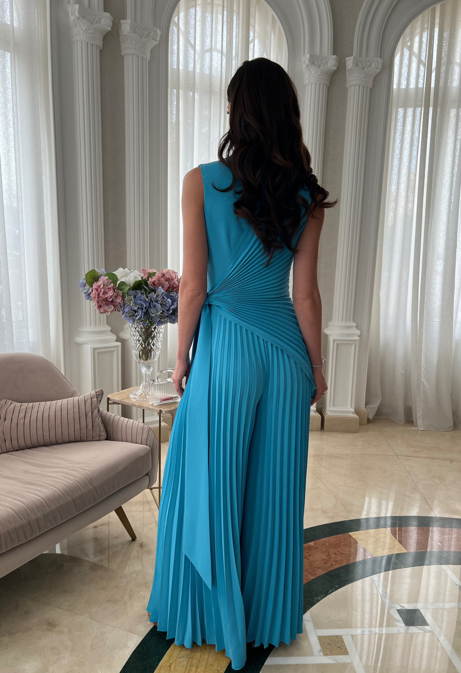 Jumpsuit in pleated crepe in blue