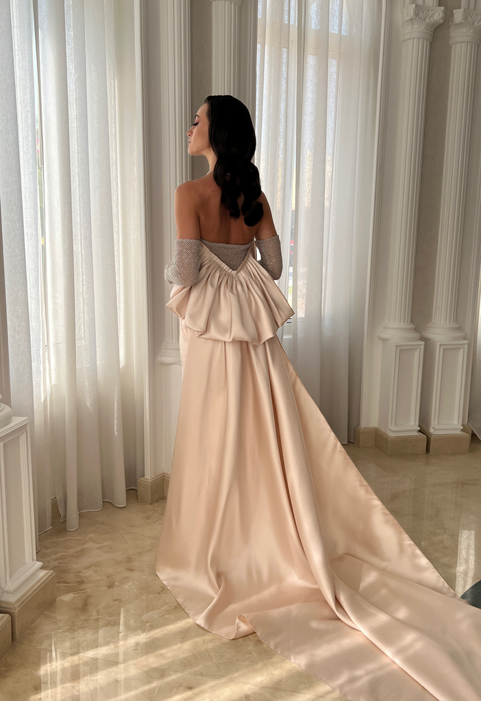 Gown with rhinestone sleeves