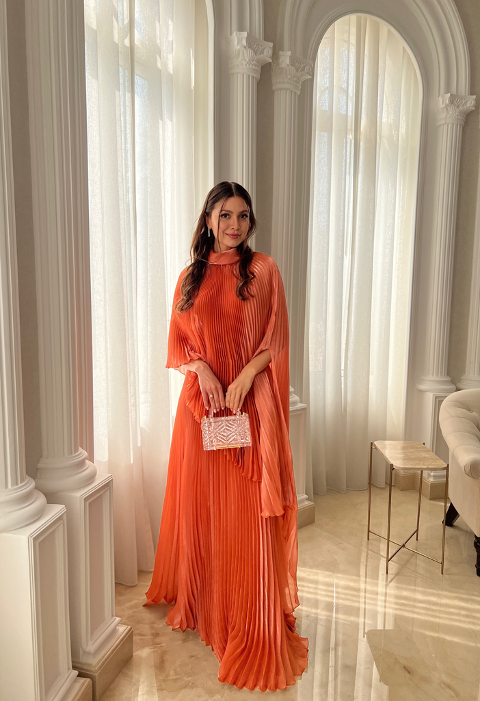 Fully pleated orange dress
