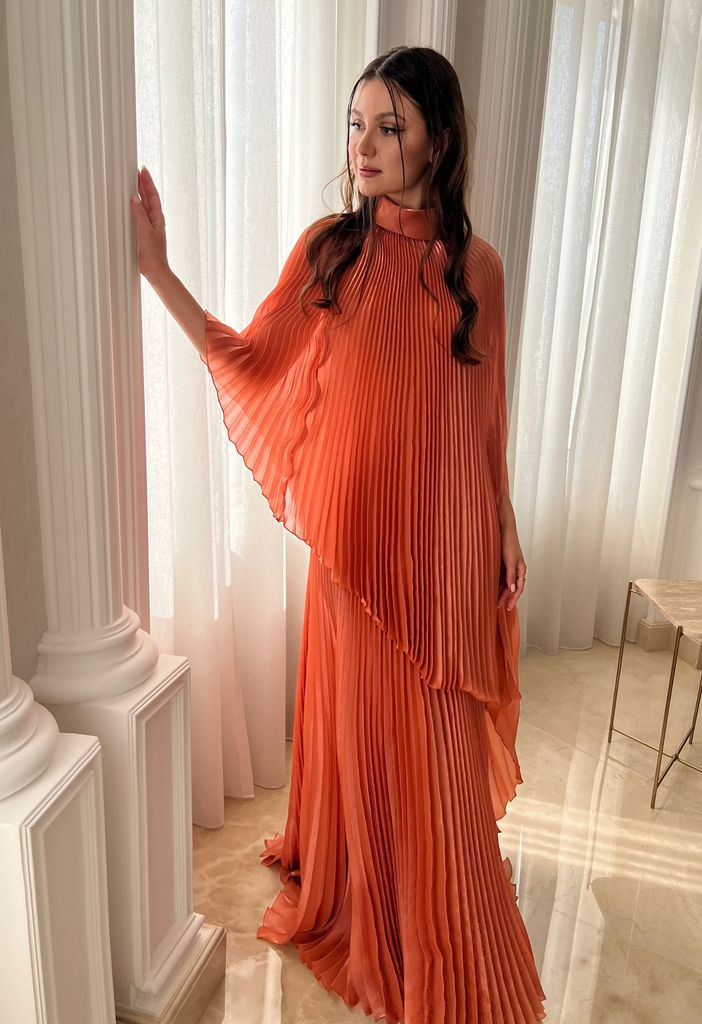 Fully pleated orange dress